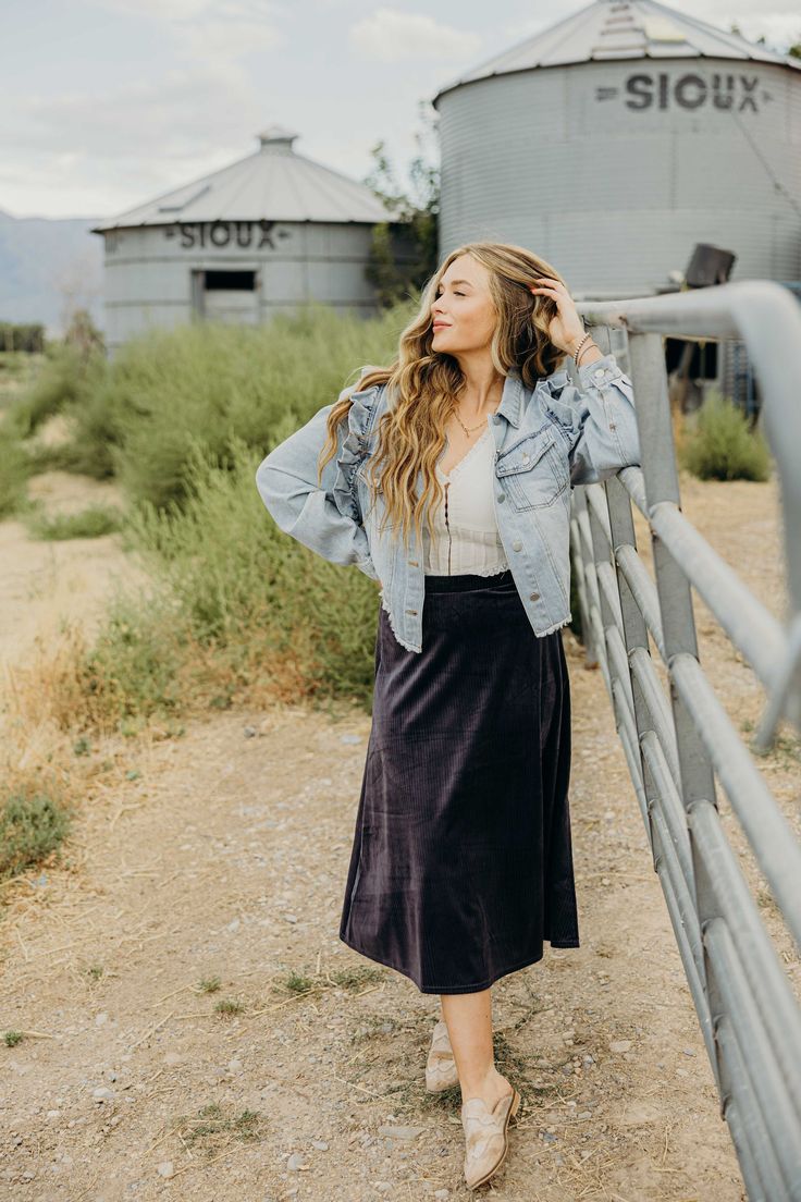 Step out in style with the Arlet Jacket! This vintage washed denim jacket features a playful ruffled armhole and super soft fabric, making it a comfortable and trendy addition to your wardrobe. Stay stylishly unique with this quirky and fun jacket. Haylee is wearing size small paired The Jovie Skirt and The Diann Corset Casual Ruffled Denim Jacket For Fall, Trendy Ruffled Denim Jacket For Fall, Long Sleeve Denim Jacket With Ruffles For Fall, Fall Denim Jacket For Brunch, Fun Jacket, Midi Length Skirts, Curvy Dress, Cool Jackets, Heritage Collection