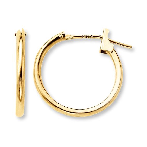 These polished 14K yellow gold hoop earrings add a hint of sparkle to any attire. Made with durable hinged backs, these petite gold hoops are an ideal choice. Pearl Diamond Jewelry, Cross Jewelry Necklace, Fan Jewelry, Jewelry Staples, Jewelry Advice, Jared The Galleria Of Jewelry, Diamond Wedding Rings Sets, Yellow Gold Earring, Accessories Jewelry Earrings