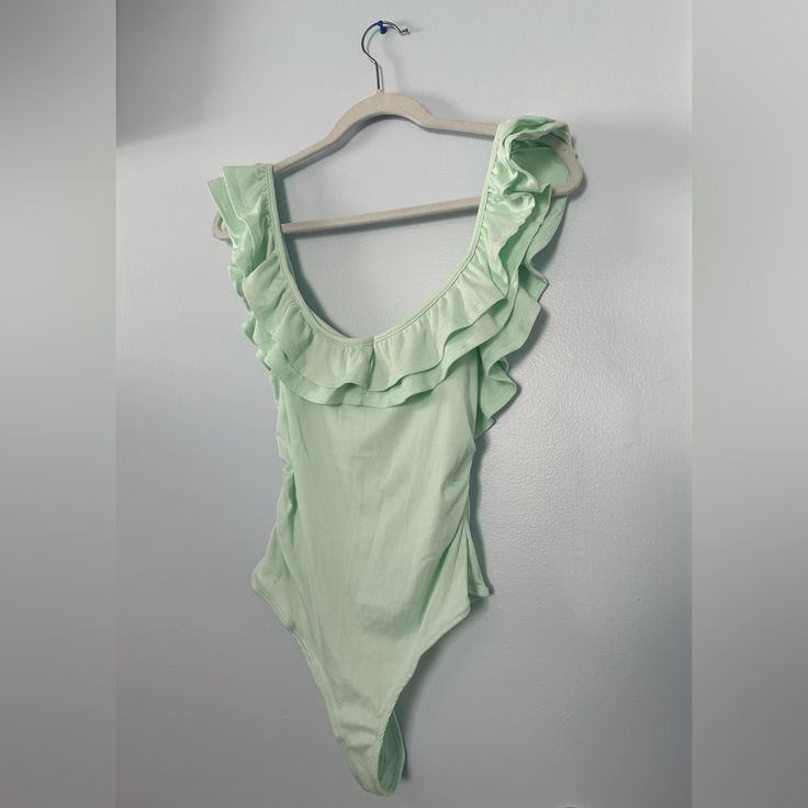 Ardene Mint Green Bodysuit! Comfortable & Stretchy Material! Never Worn With Tags, Size Small. Ships Next Day! Open To Negotiations! Please Message Or Leave A Comment! Casual Stretch One Pieces For Spring, Trendy Lined Summer One Pieces, Summer Cotton Swimwear With Ruffles, Stretch Swimwear For Spring Day Out, Stretch Swimwear For A Day Out In Spring, One-piece Bodysuit For Spring And Summer, Trendy Sleeveless One Piece For Spring, Summer One-piece Cotton Swimwear, Trendy Sleeveless One-piece For Spring