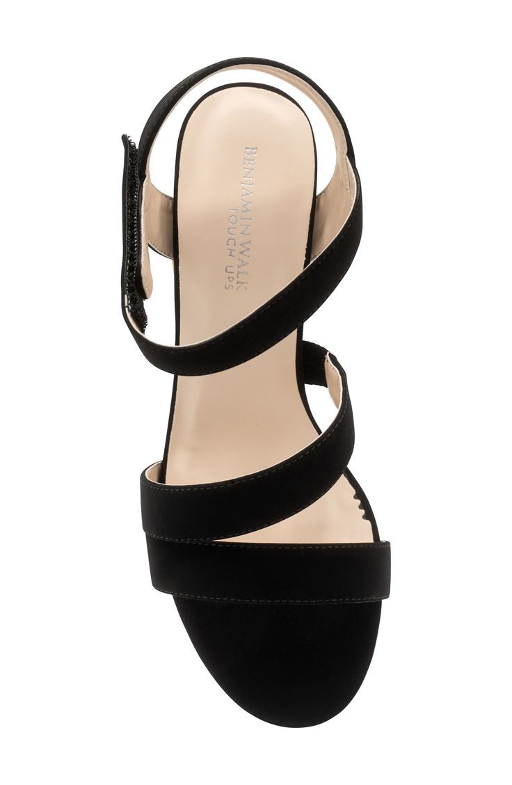 A strappy upper adds party-ready allure to an elegant sandal set on a cushioned footbed and wrapped block heel. 2 3/4" heel Adjustable ankle strap with hook-and-loop closure Cushioned footbed Synthetic upper, lining and sole Imported Adjustable Ankle Strap Wedge Sandals For Party, Wedge Sandals With 4-inch Heel For Night Out, Elegant Party Wedge Heel Slingback Sandals, Elegant Party Slingback Wedge Sandals, Night Out Sandals With Stacked Low Heel, Night Out Sandals With 4-inch Wedge Heel, Sandals With Stacked Low Heel For Night Out, Block Heel Sandals With Heel Strap For Night Out, Evening Block Heels With 4-inch Wedge Heel