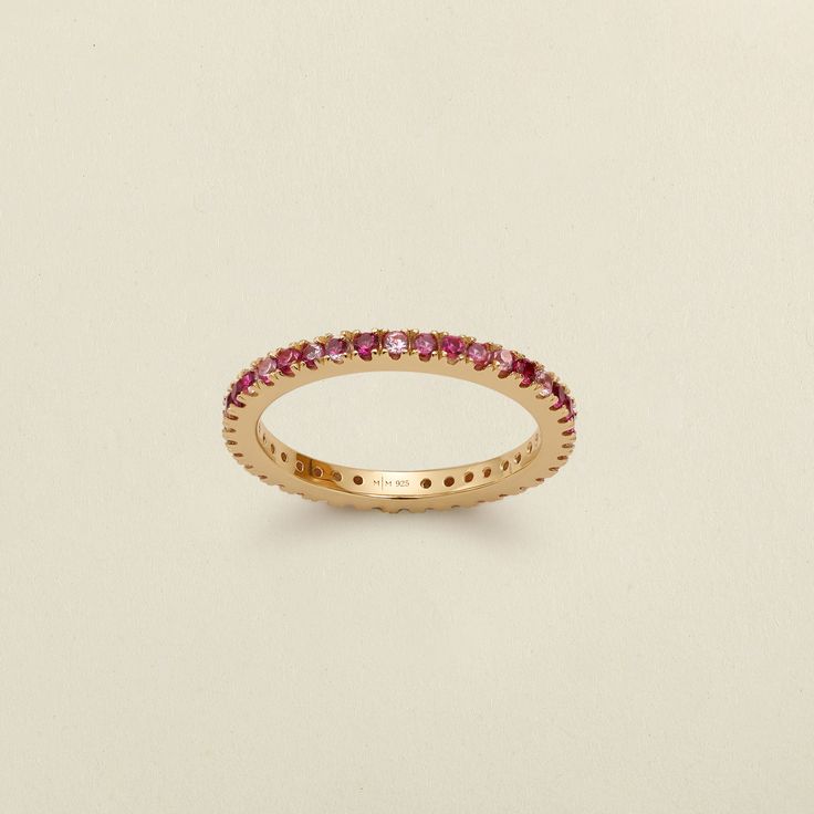 Everything’s sugar and spice with the brightly varied shades of this pink CZ ring. Sprinkled spontaneously around the entire band, the unique combination of magenta and blush stones gives each ring its own flavor- and the unlimited stacking potential is just the icing on top. Pink Eternity Band Fine Jewelry, Pink Fine Jewelry Eternity Band For Promise, Pink Eternity Band Promise Ring Fine Jewelry, Elegant Pink Gemstone Eternity Band, Fine Jewelry Pink Eternity Band With Gemstone, Pink Gemstone Eternity Band Fine Jewelry, Pink Half Eternity Round Band, Pink Eternity Band Ring As Gift, Pink Stackable Half Eternity Rings As Gift