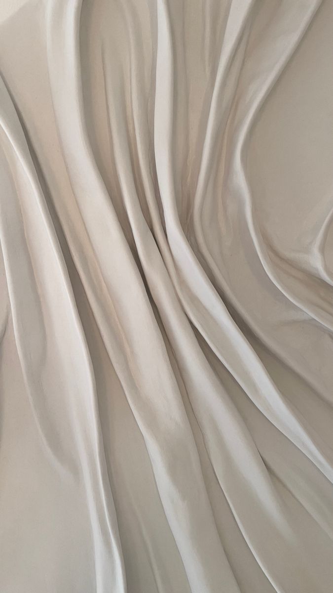 the white fabric is very soft and flowing in the wind with it's smooth folds