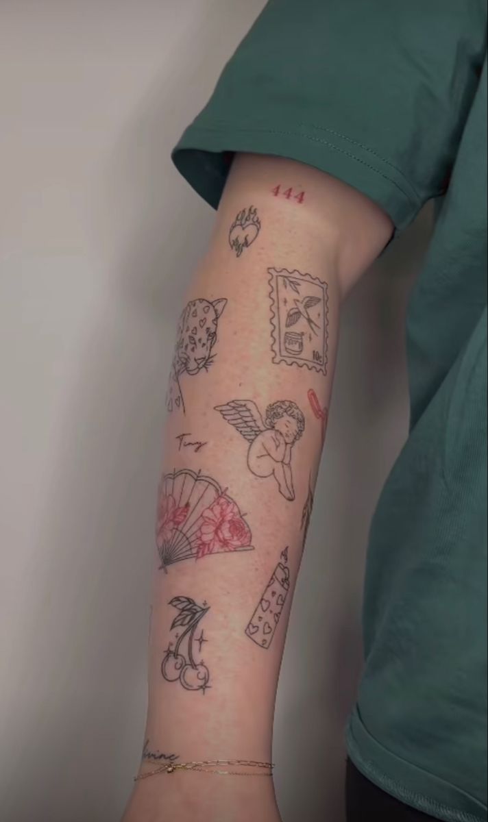 a woman's arm with tattoos on it