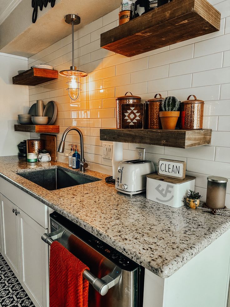 the kitchen counter is clean and ready to be used for cooking or baking, as well as other items