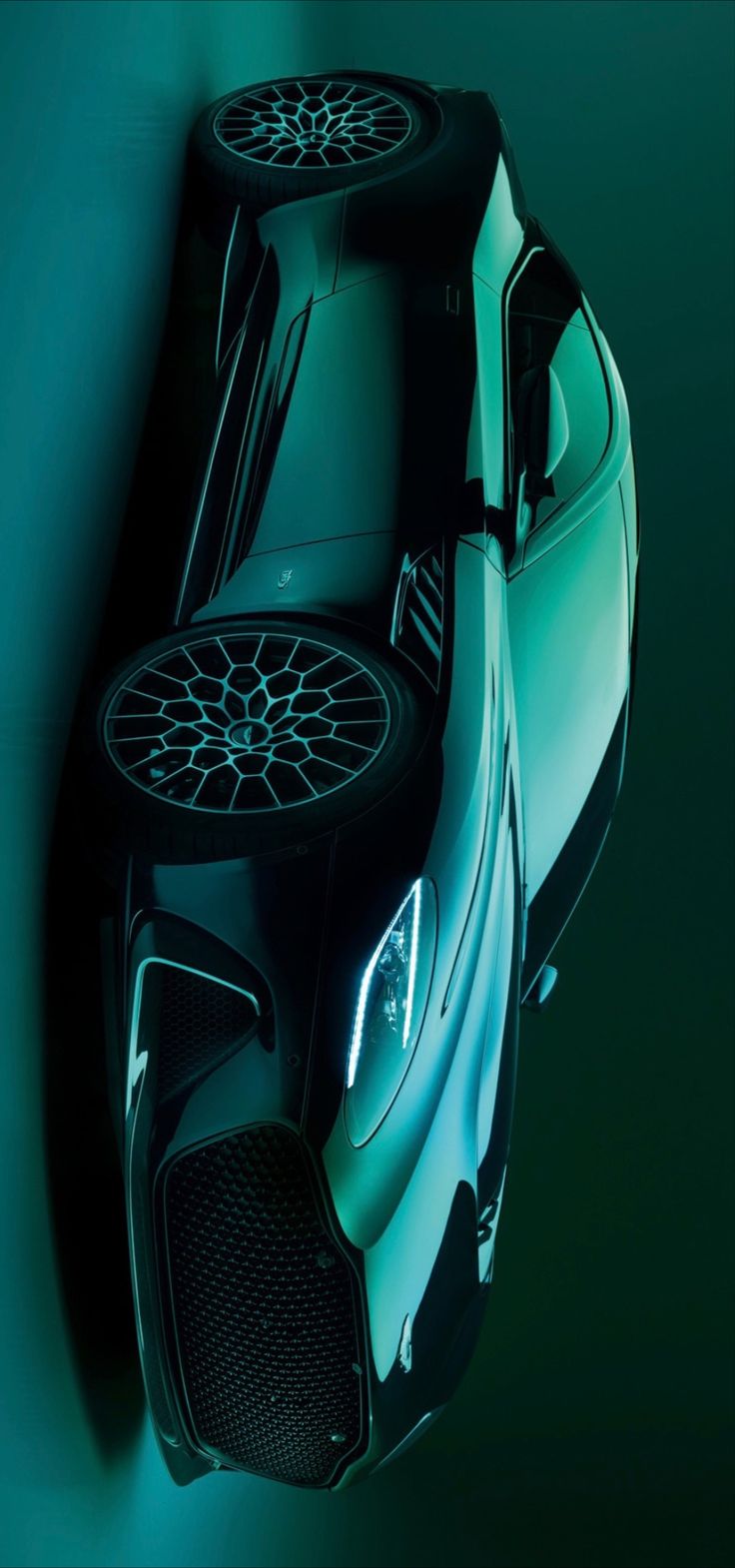 a black and green car is shown from above