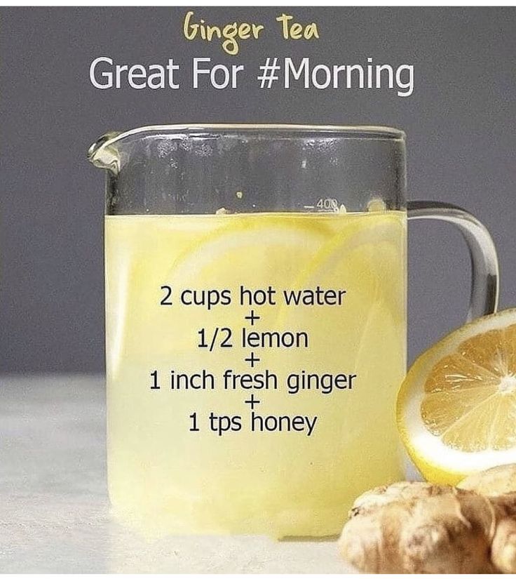 ginger tea in a mug with lemon and ginger on the side