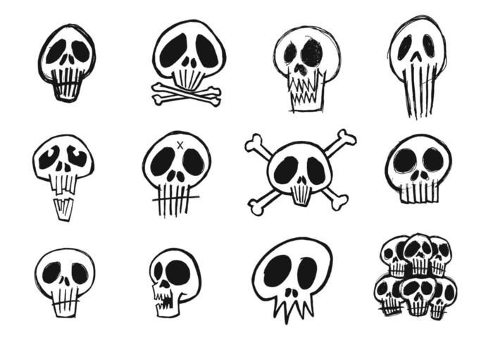 a bunch of skulls that are drawn in black and white