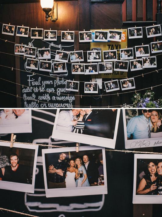 several photos hanging from clothes line in front of a wall