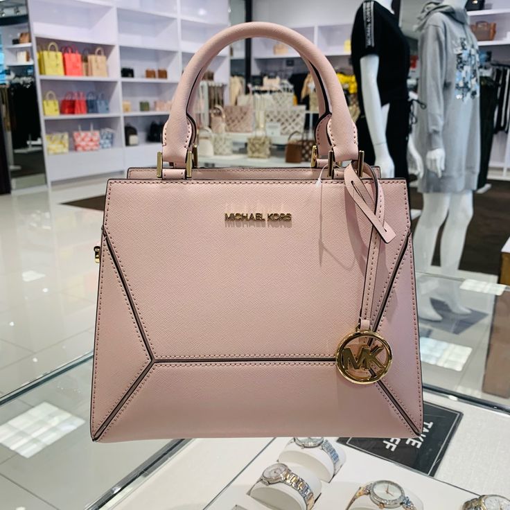 100% Authentic New With Tags Color: Powder Blush Michael Kors Prism Medium Messenger - Measurements: 10.5”L X 8.5"H X 5” D - Double Handles: 4-1/4"L - Adjustable/Removable Strap: 16-1/4"L-18-1/2"L - Chain And Leather Strap - Zip Closure - Gold Tone Hardware - 1 Zipper Compartment And 2 Open Compartments - Interior: 1 Front Slip Pocket And 1 Back Zipper Pocket - Saffiano Leather - Lining: Polyester High-end Pink Shoulder Bag, High-end Pink Satchel With Detachable Handle, Michael Kors Designer Satchel With Double Handle, Designer Michael Kors Satchel With Branded Hardware, Michael Kors Designer Double Handle Satchel, Designer Michael Kors Shoulder Bag With Top Carry Handle, Michael Kors Designer Top Handle Satchel, Designer Michael Kors Shoulder Bag With Top Handle, Luxury Michael Kors Satchel With Top Carry Handle