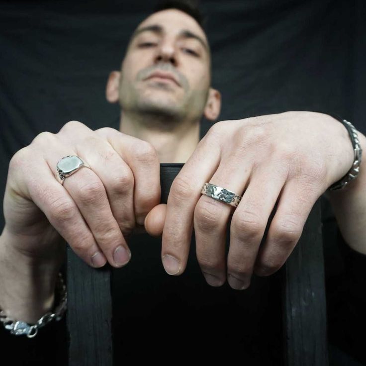 A signet ring made from hand poured molten silver that is sand cast in a mould with chain links for added texture and dimension. Sterling silver signet with silver link chain and a mixed metal sterling silver signet with gold link chain are available. Check out the separate listing for the signet with red sapphires! Each is made individually! If item is out of stock, or you need a different size, it can be made to order. Feel free to inquire! Modern Silver Engraved Ring Tarnish Resistant, Minimalist Chain Link Metal Rings, Minimalist Hand Cast Ring, Minimalist Sterling Silver Tarnish Resistant Chain Ring, Minimalist Sterling Silver Chain Ring, Tarnish Resistant, Silver Chain Link Rings Gift, Timeless Silver Signet Ring For Promise, Sterling Silver White Gold Signet Ring With Oxidized Finish, Silver Sterling Chain Ring Tarnish Resistant