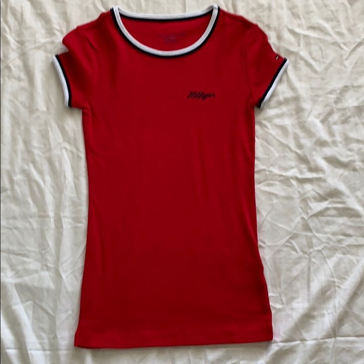 Tommy Hilfiger - T-Shirt - Never Worn Trendy Tommy Hilfiger Cotton T-shirt, Casual Red Tommy Hilfiger T-shirt, Tommy Hilfiger Spring Crew Neck Tops, Tommy Hilfiger Crew Neck Tops For Spring, Tommy Hilfiger Stretch Top For Spring, Trendy Tommy Hilfiger Crew Neck Top, Spring Tommy Hilfiger Stretch Top, Spring Stretch Top By Tommy Hilfiger, Tommy Hilfiger Graphic Tee For Spring