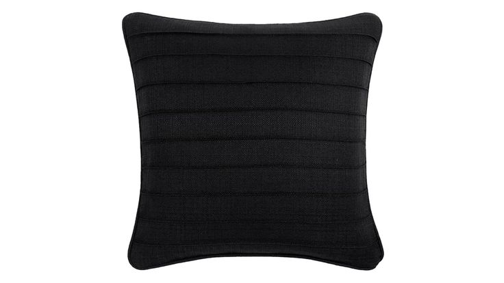 a black pillow on a white background