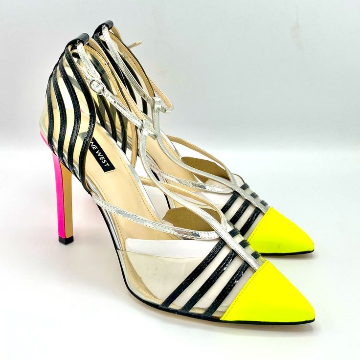 Yellow & Pink Neon Pointed Toe Ankle Strap 5” Heel. Insole Measures 10.5” Adjustable Ankle Strap Brand New. Never Worn Slight Scuff During Storage. No Box Shoes Only Yellow Heels With 4-inch Heel For Spring, Spring Yellow Heels With 4-inch Heel, Yellow Bold Ankle Strap Heels, Neon Yellow Pointed Toe Heels For Party, Neon Heels For Spring, Trendy Yellow Heels For Spring, Bold Yellow Heels For Party, Bold Yellow Summer Heels, Yellow 4-inch Heels For Spring