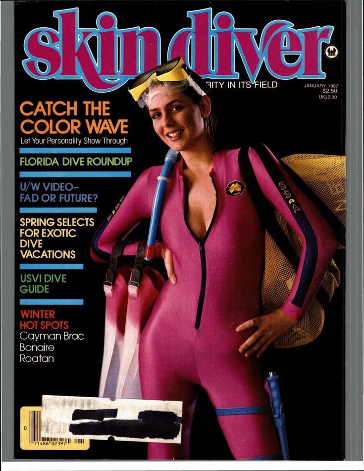 a magazine cover with a woman in a pink body suit and goggles on the cover