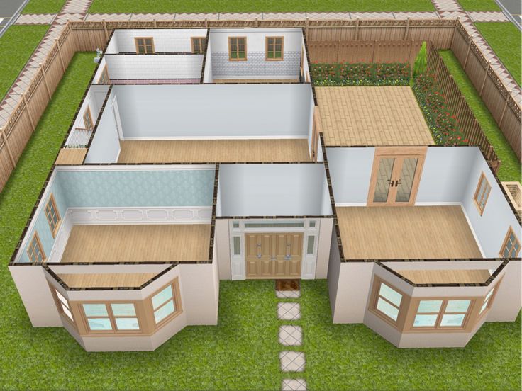 an aerial view of a house with several rooms and two bathrooms on the first floor