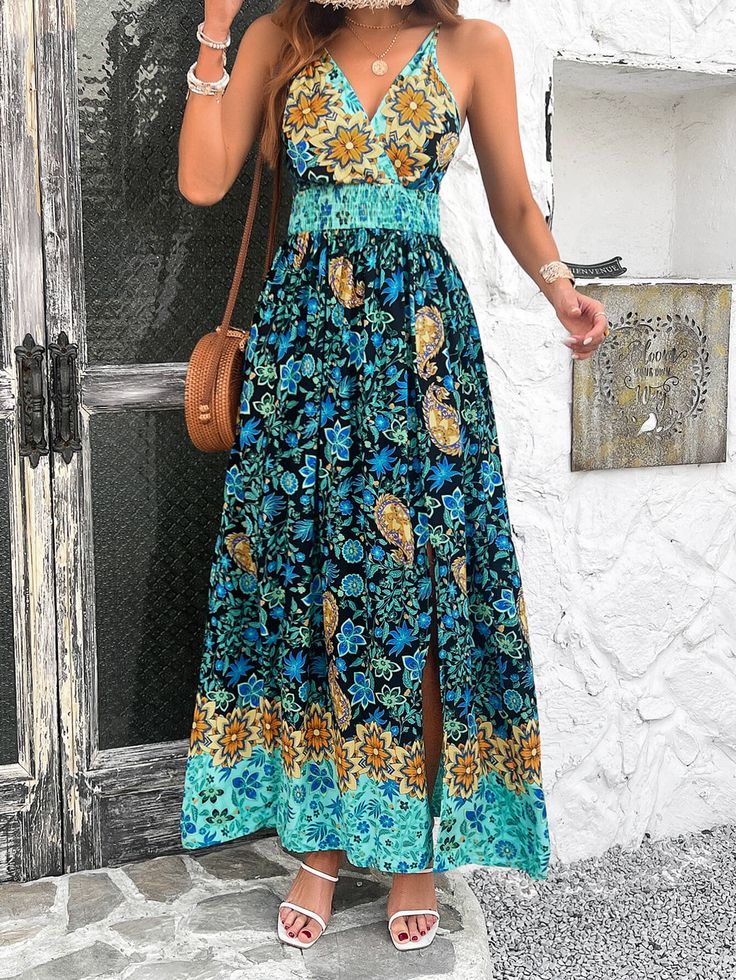 Introducing the Yasmin Floral V-Neck Boho Maxi Dress - the perfect combination of feminine and bohemian style. With its flowy silhouette and delicate floral print, this dress is perfect for any occasion. Get ready to turn heads and feel confident in this unique and playful piece! Size Guide: Model is 5’8” tall, and has a 33.8” bust, 24.2” waist, & 35.7” hips. She is wearing a S / US 4 / AU 8. This dress is true to size. Material: 100% Viscose Feature: V-neckline. Sleeveless. Boho floral prints. Front slit. Not lined. Maxi length. Relaxed fit. Care Instructions: Machine wash / Cold hand wash Flowy V-neck Maxi Dress With Tropical Print, Bohemian Maxi Dress With Vibrant Print And V-neck, Vibrant Printed V-neck Maxi Dress, Vibrant V-neck Maxi Dress With Floral Print, Bohemian V-neck Maxi Dress With Paisley Print, Tiered Dresses, Bandage Dress Bodycon, Faux Leather Dress, Split Dress