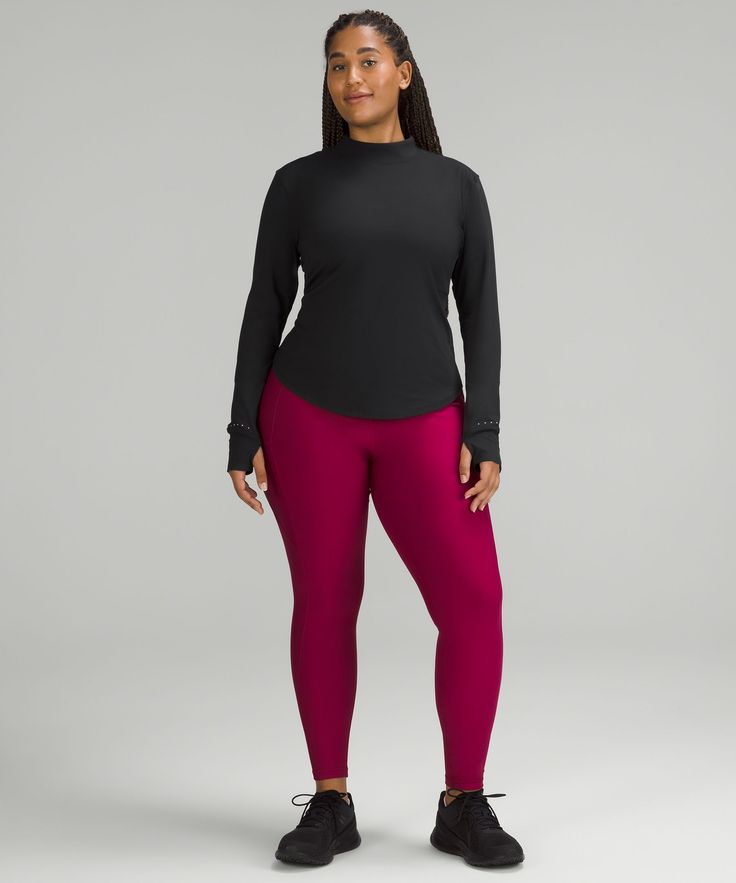 Don't be afraid to pick up the pace. Unzip the shoulder vent on this soft running top for easy ventilation when you need it. Designed for Running. Skims your body:Sits below the waistband for moderate, everyday coverage. Hidden zippered pocket to stash your cards and key. Thumbholes and Cuffins are the running gloves you can't forget. Reflective details. Unzip the shoulder vent for airflow. Versatile Lululemon Tops For Fall, Lululemon Athleisure Tops For Winter, Lululemon Athleisure Winter Top, Lululemon Winter Athleisure Top, Stretchy Lululemon Crew Neck Top, Stretch Lululemon Tops For Layering, Lululemon Crew Neck Tops For Layering, Lululemon Stretch Tops For Layering, Lululemon Stretch Crew Neck Top