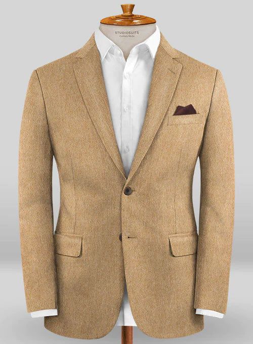 There's nothing like the feeling of baby-fine cashmere against bare skin. Crafted from pure cashmere, our Colombo Tan Cashmere Jacket is a cut from Colombo Royal Cashmere, world's top producer of cashmere fabric, with a tan hue that exudes a calm and relaxing vibe. The jacket is a perfect pick for business meetings and casual occasions alike, simply team it up with a well-pressed white shirt, maroon pocket square and brown monk strap shoes. 
 
 Look Includes  Colombo Tan Cashmere Fabric  Two But Fitted Beige Tweed Jacket With Long Sleeves, Fitted Tweed Jacket With Pressed Crease And Long Sleeves, Beige Long Sleeve Tweed Jacket For Semi-formal Occasions, Fitted Long Sleeve Tweed Jacket With Pressed Crease, Luxury Wool Sport Coat With Long Sleeves, Luxury Long Sleeve Wool Sport Coat, Beige Long Sleeve Suits For Fall, Beige Long Sleeve Business Casual Suit, Beige Long Sleeve Suits For Business Casual