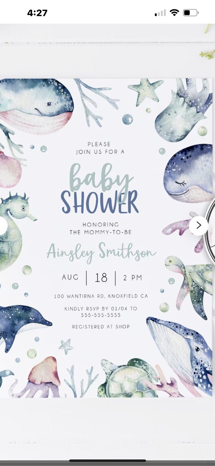 a baby shower is shown with watercolor whales