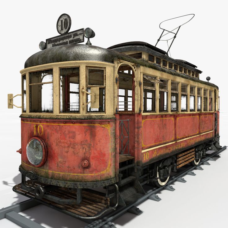 an old trolley car sitting on top of a train track with no wheels and windows