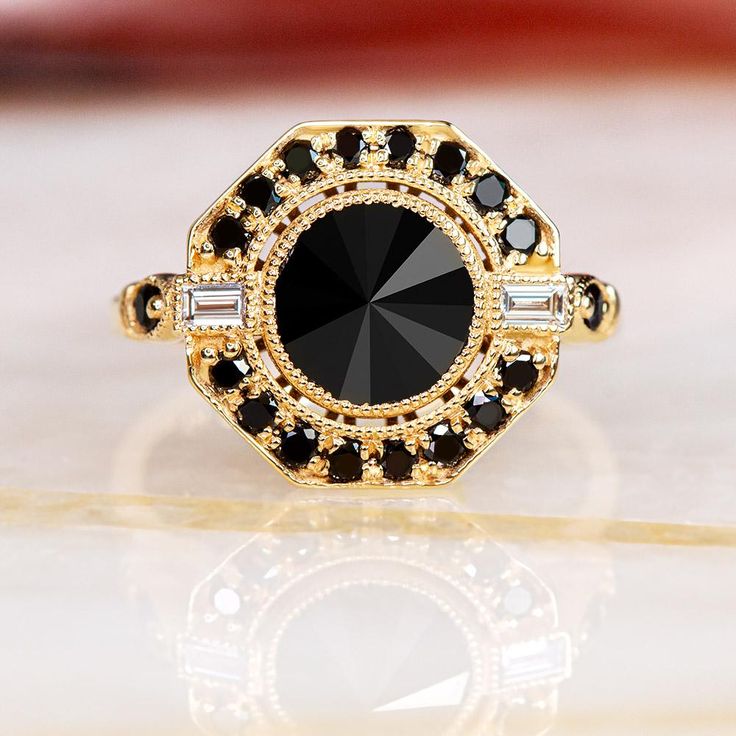 Stunning Natural Black Round Cut Inverted Diamond Ring Made of Solid 14k Gold, a Cleopatra Ring, Uniquely Designed with Inverted Round Cut Earth Mined Diamonds with Beautiful Natural White Baguette Cut Diamonds, a Unique Statement Black Diamond Jewelry for Women. This stunning inverted round-cut natural black diamond ring is sure to turn heads. Cleopatra Design head turning black engagement ring. Black diamonds have a magnetic shine and unique spark, they can glow in the distance - even when it' Black Halo Jewelry For Anniversary, Black Jewelry With Center Stone For Anniversary, Black Round Halo Jewelry, Round Black Halo Jewelry, Black Jewelry With Halo Setting For Anniversary, Elegant Black Cluster Ring For Promise, Black Jewelry With Halo Setting For Formal Occasions, Heirloom Black Round Cut Ring, Fine Jewelry Black Diamond Ring