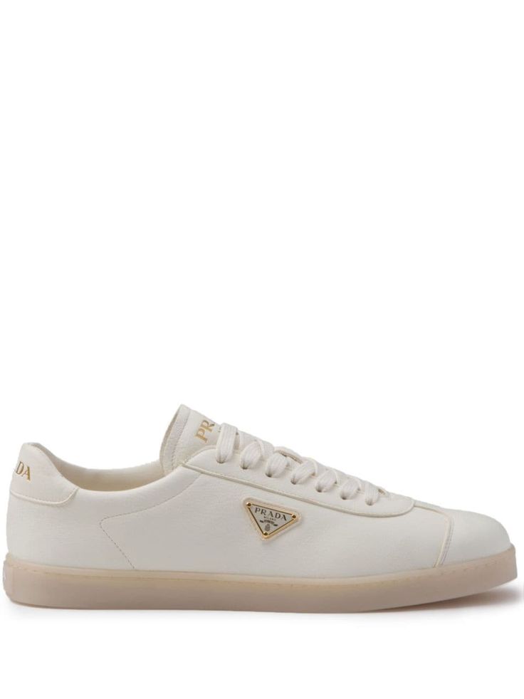 ivory white calf leather grained texture logo-debossed tongue enamel triangle logo to the side branded heel counter logo at the sole round toe front lace-up fastening branded insole flat rubber sole This piece comes complete with a protective dust bag. Luxury Low-top Sneakers With Textured Sole, Luxury Lace-up Sneakers With Logo Detail, White Calf Leather Sneakers With Embossed Logo, Cream Sneakers With Embossed Logo For Streetwear, Lace-up Sneakers With Embossed Logo In Calf Leather, Low-top Custom Sneakers With Embossed Logo In Calf Leather, Modern Low-top Sneakers With Logo Plaque, Calf Leather Sneakers With Logo And Round Toe, Casual Sneakers With Embossed Logo In Calf Leather