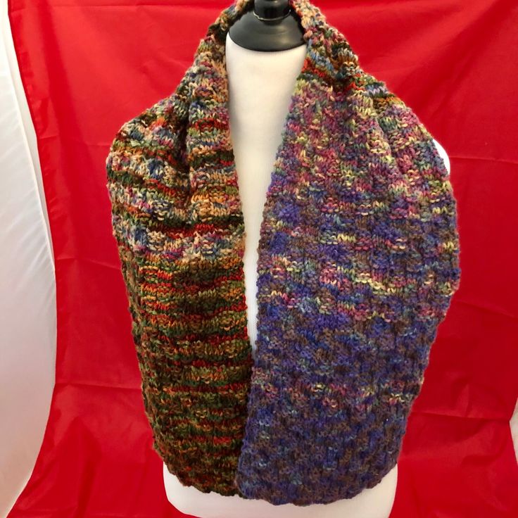 Hand Knit Arcrylic Scarf, Approximately 52 Inches Long. This Gorgeous Artistic Scarf Has Two Distinct Halfs With A Warm And Cool Color Contrast. On The Cool Side Blue & Purple Dominate. On The Warm Side Dominant Colors Are Red, Rust & Dark Green. Beautiful Variegated Yarns! New Without Tags. Knitted Acrylic Infinity Scarf One Size, Knitted Acrylic Infinity Scarf, One Size Knitted Acrylic Infinity Scarf, Knitted Acrylic Scarves For Fall, Knit Acrylic Yarn Scarf One Size, Acrylic Knitted Scarves For Fall, Chunky Knit Acrylic Scarf One Size, One Size Knit Acrylic Scarves, Fall Knitting Pattern For Cold Weather In Acrylic