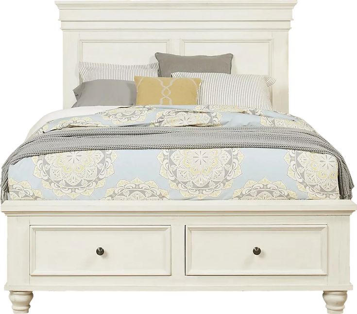 a white bed with two drawers underneath the headboard and night stand on top of it