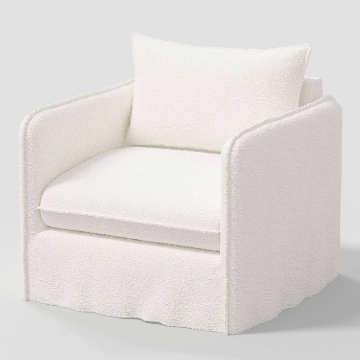 a white chair with a pillow on top of it