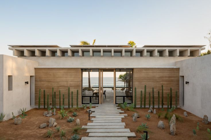 an entry way to a house with steps leading up to it