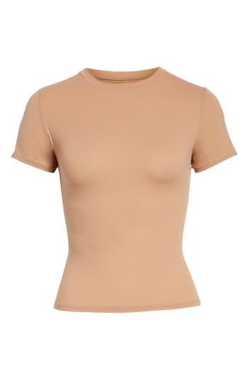 This crewneck T-shirt that perfectly hugs your curves with a buttery-soft feel is perfect to wear alone or layer under closet essentials. 20 1/2" length (size Medium) Crewneck 79% nylon, 21% spandex Machine wash, line dry Imported Women's Clothing Sienna Color, Boyfriend Tshirt, Tan Shirt, Boyfriend T Shirt, Athletic Shirts, Trending Tshirts, Collar Shirts, T Shirt Top, Casual Button Down Shirts