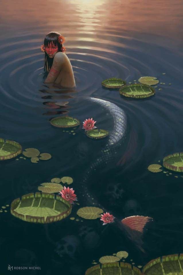 a woman floating on top of a body of water surrounded by lily pads