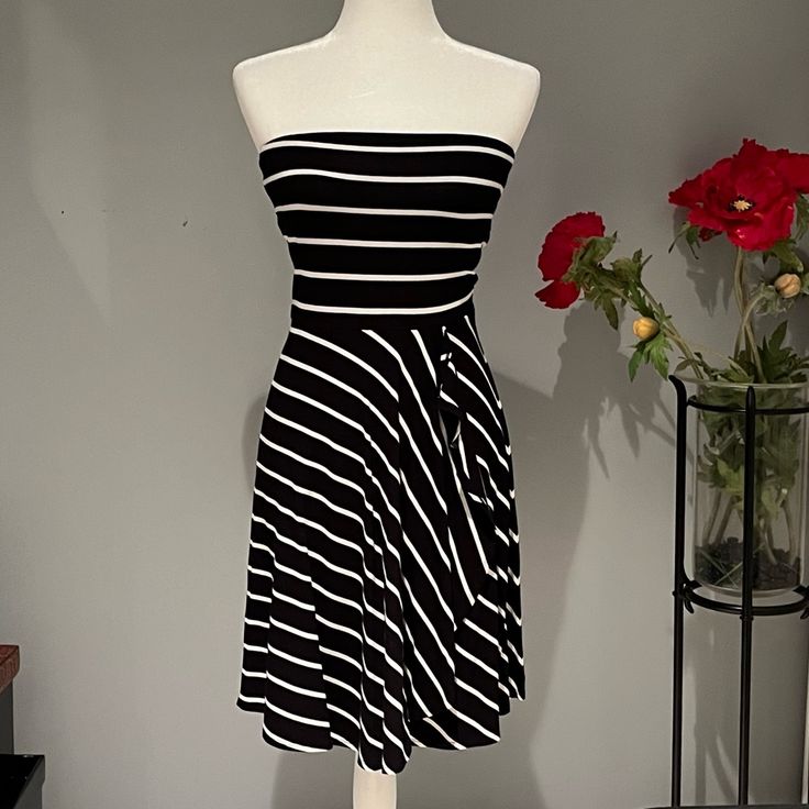 Striped Strapless Dress With Built In Halter Style Bra In Rayon And Spandex Featuring A Faux Wrap Style Skirt That Creates A Ruffle Effect Along The Front From The Waist To The Hem New Nwt Material: 95% Rayon 5% Spandex Style: Strapless Color: Black White Pattern: Horizontal And Diagonal Stripes Size: Xsp Approximate Measurements (Flat Lay) 14” B 33” L If You Like: Romantic Streetwear Moto Biker Motorcycle Edgy Goth Boho Bohemian Punk Anime Rock Rocker Chic Cool Spiky Spikes Rivets Studs Prairie Punk Anime, Bohemian Punk, Bride Lingerie, Black White Pattern, Rocker Chic, Spring Boho, Diagonal Stripes, Style Skirt, Ann Taylor Dresses