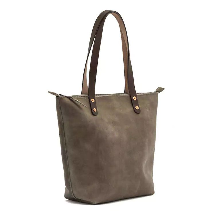 Whether you're running errands or looking to elevate your everyday style, our Eden Large Zippered Leather Tote Bag is the perfect companion. Crafted from premium full-grain US steerhide leather, this tote feels luxurious while offering exceptional durability. The 10 oz vegetable-tanned leather handles are designed to withstand daily use and provide added strength. The interior features soft, natural suede, with solid copper rivets adding a refined touch of elegance. With a secure zippered top fo Textured Leather Tote Shoulder Bag For Daily Use, Daily Use Faux Leather Satchel With Leather Handles, Casual Textured Leather Bag For On-the-go, Everyday Textured Leather Bucket Bag With Double Handle, Everyday Use Textured Leather Bucket Bag With Double Handle, Textured Leather Shoulder Bag For Daily Use, Casual Textured Leather Tote Shoulder Bag, Textured Leather Tote Bucket Bag For Everyday Use, Textured Leather Bucket Bag Tote For Everyday Use