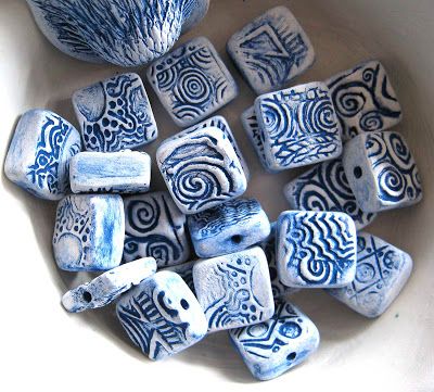 blue and white ceramic beads in a bowl