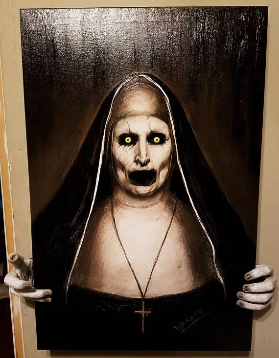 a painting of a nun with yellow eyes