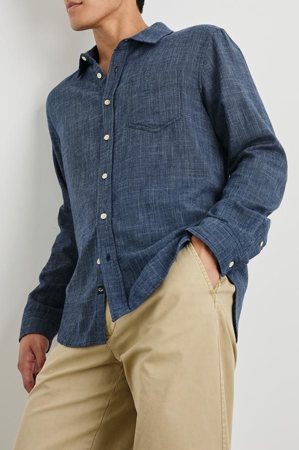 Super soft, breathable cotton fabric mixed with a relaxed body shape makes the Wyatt the perfect Southern California inspired button-down. A classic shirt featuring a single patch pocket at chest.    Relaxed fit 100% Cotton    Machine wash cold. Tumble dry low, remove promptly. No bleach. Cool iron when needed. Denim T Shirt, Denim Sweater, Short Shirts, Mixing Fabrics, Classic Shirt, Denim Pant, Body Shape, Denim Shop, Denim Shirt