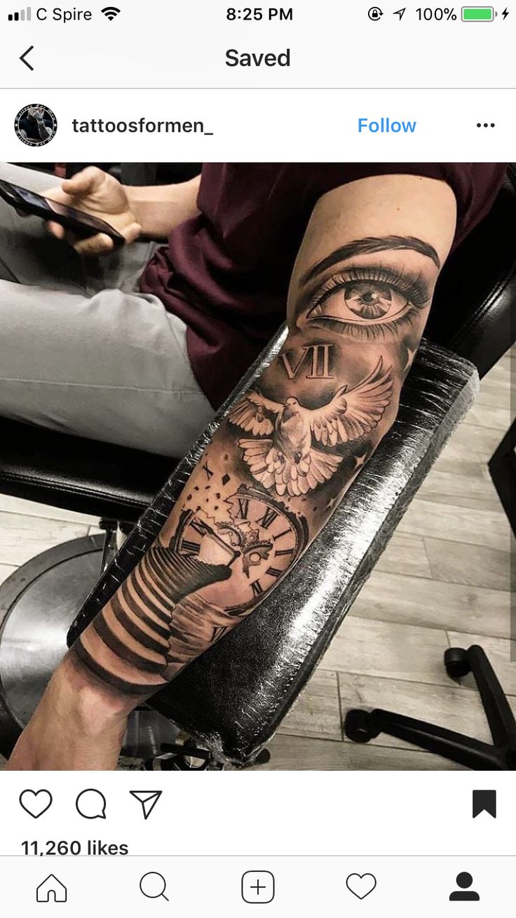 a person with a tattoo on their leg and an eye in the middle of it