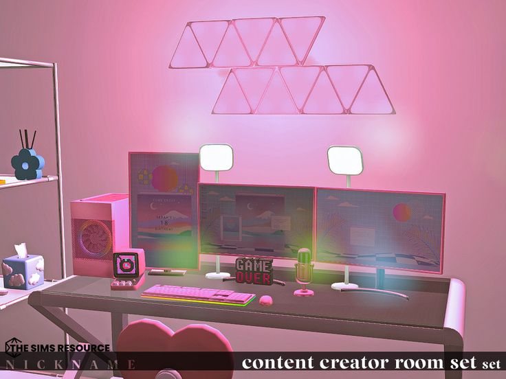 a computer desk with three monitors on it and pink walls in the background, along with other office supplies