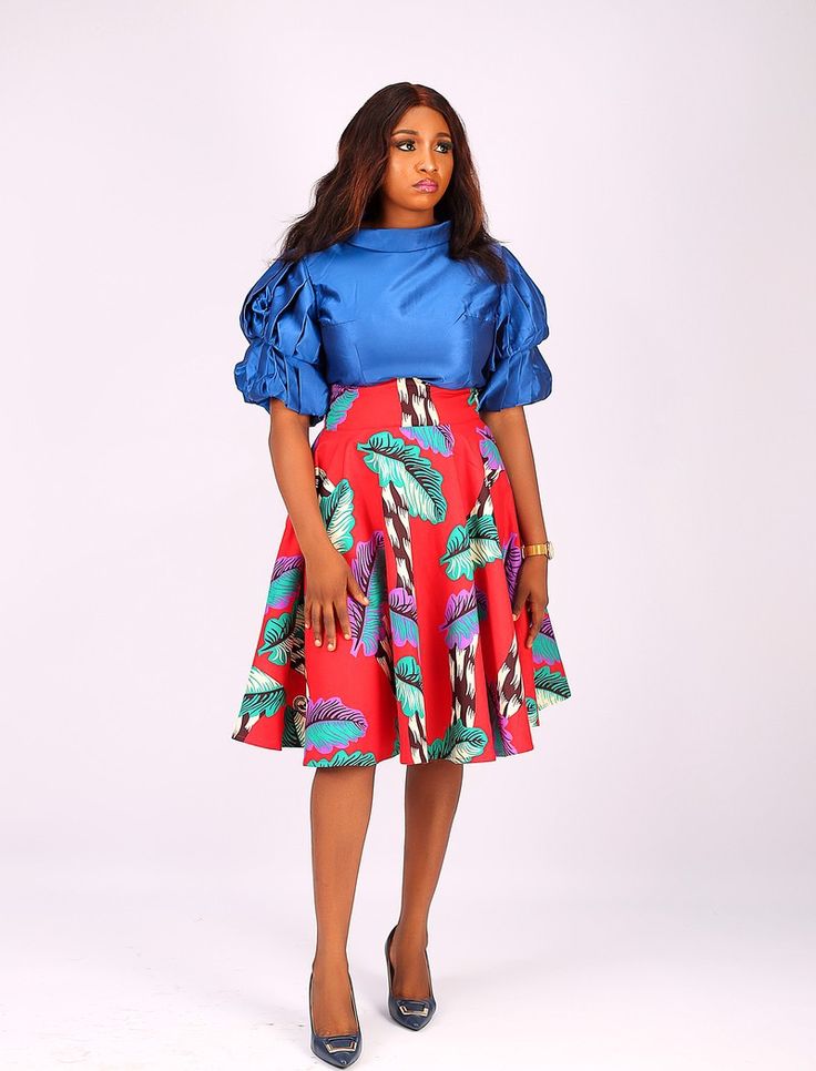 Ankara flare skirt paired with plain mikado blouse Ankara Flare Skirt, Lace Dress Classy, Plain Skirt, White Top Women, Chiffon Kimono, Dress Classy, Skirt And Top, Design Dresses, Skirt And Blouse