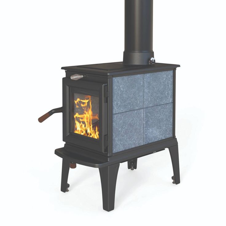 a black stove with a fire burning in it