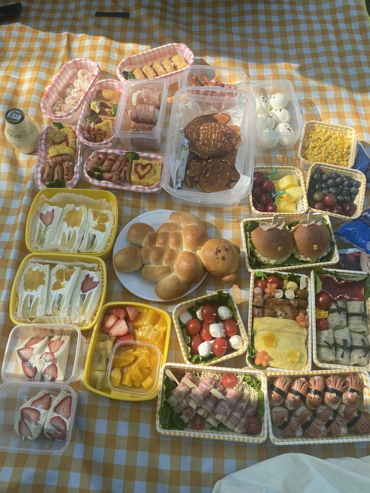 a table topped with lots of different types of food