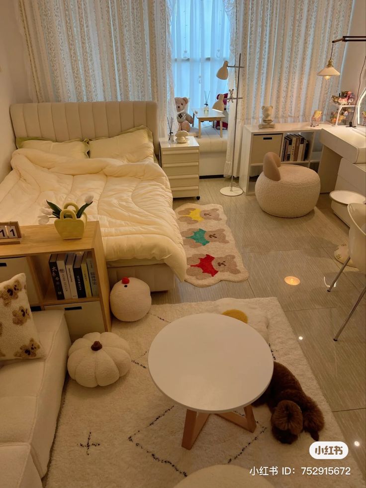 a small bedroom with white furniture and decorations on the walls, carpeted flooring