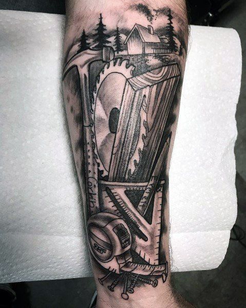 a man's arm with a black and white tattoo design on it, including an arrow