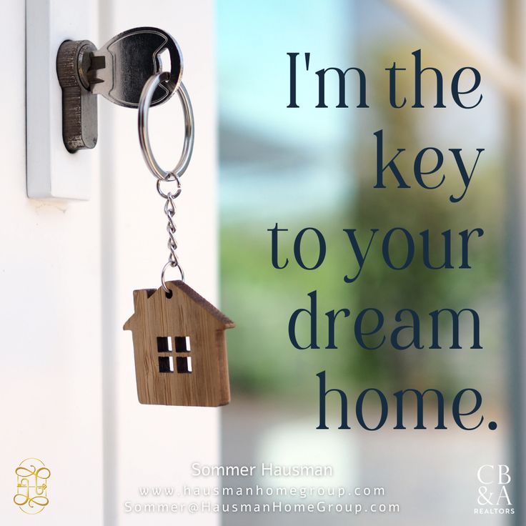 a key hangs from a house shaped keychain that reads, i'm the key to your dream home