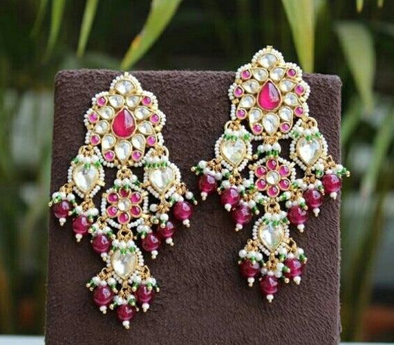 *It's Handmade Indian Ethnic Kundan Designer Fashion Earrings with Pink and White Combination. *It's Multi Color Kundan Stones Settings and 22k gold Plating as shown in picture. *It is Real Kundan Design with Antique Touch and 3 inch long with hangings of pearls. *Our all jewelry is made from semiprecious stones and beads. *WARRANTY: ITS GENUINE HANDMADE JEWELRY AND WE ARE GIVING LONG LIFE WARRANTY FOR OUR ALL ITEMS. All of our Kundan Jewelry is 100% handmade with ancient Kundan stone setting me Partywear Earrings, Kundan Chandbali, Earrings Kundan, Bridal Earrings Studs, Rose Gold Bridesmaid, Indian Pink, Crystal Teardrop Earrings, Wedding Bride Jewelry, Kundan Jewelry