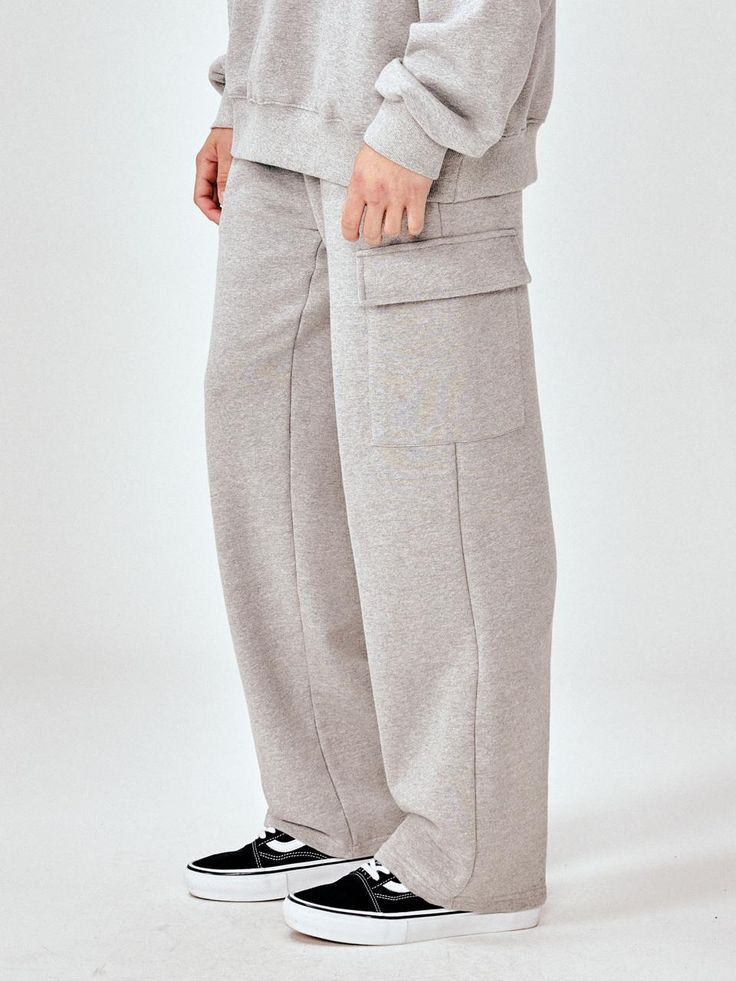 This is a casual and comfortable cargo sweatpants that are made out of high quality cotton and polyester blend fabric. With design detail of regular silhouette, soft and sturdy fabric with some elasticity, and cargo pockets, you can style it for casual and trendy outfit. - Regular silhouette- Adjustable string on the waistband- Soft touch of the fabric- Cargo pockets on the side Utility Sweatpants With Pockets For Loungewear, Relaxed Fit Cargo Pants With Multiple Pockets For Loungewear, Long Cargo Pants With Multiple Pockets For Loungewear, Loungewear Cargo Pants With Multiple Pockets, Relaxed Fit Cargo Pants With Cargo Pockets, Relaxed Fit Comfortable Cargo Pants, Cotton Sweatpants With Cargo Pockets For Loungewear, Comfortable Relaxed Fit Cargo Pants With Pockets, Baggy Comfortable Cargo Pants With Pockets