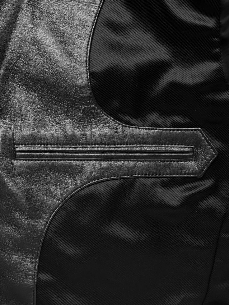 A modern take on traditional tailoring, TOM FORD's blazer has been made in Italy from leather with wide notch lapels and soft, unstructured shoulders for a relaxed effect. It's lined for comfort and smooth layering. Leather Blazer With Notch Lapel And Concealed Placket, Business Leather Jacket With Concealed Placket, Designer Tailored Leather Jacket, Designer Leather Jacket With Concealed Placket For Business, Elegant Black Leather Jacket With Concealed Placket, Black Leather Sport Coat With Notch Lapel, Luxury Black Leather Jacket With Hidden Buttons, Luxury Black Leather Jacket With Hidden Button Closure, Tailored Black Leather Blazer