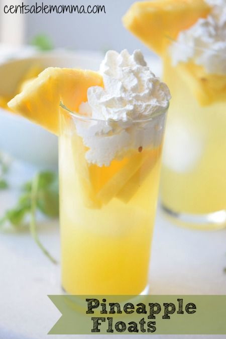 a pineapple drink with whipped cream on top