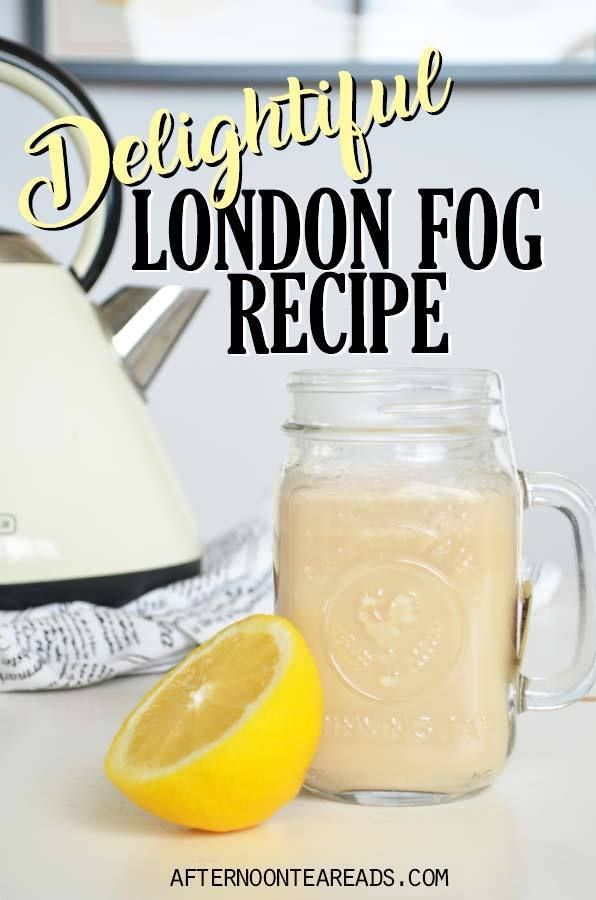 a glass jar filled with liquid next to a lemon and a tea kettle on a table